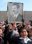 Almotamar Net - BAGHDAD, Iraq Jan 8, 2007 (AP)� Saddam Husseins trial for the killing of 180,000 Kurds in the 1980s resumed Monday with the late presidents seat empty, nine days after he went to the gallows. The courts first order of business was to drop all charges against Saddam. 