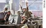 Almotamar Net - Lebanese troops and Islamic militants inside a Palestinian refugee camp exchanged heavy fire late Thursday, breaking a two-day-old truce. The gunfire and shelling lasted less than an hour at the Nahr al-Bared camp outside the city of Tripoli, before dying down. A shaky ceasefire had largely held since Tuesday.