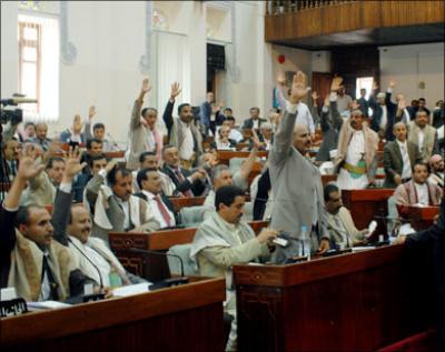 Almotamar Net - In an extraordinary session held on Wednesday, the parliament in Yemen approved decision of the President of the Republic on declaring a state of emergency. The declaration stipulated that Due to occurrence of a state of riot in some cities of Yemen and attacks on public and private properties, which constitute internal sedition threatening the national unity, the social fabric and stability and peace and for the necessity of keeping unity of the homeland and protection of citizens and public and private properties, a state of emergency is declared all over the republic for thirty days, beginning from Friday 18 March 2011. 