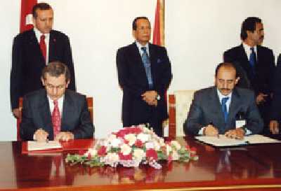 Almotamar Net - Ahmed Sofan, Deputy Prim Minister, Minister of Planning and International Cooperation (right), and Abdullatif Seren, Turkish Minister of State, Deputy Prime Minister, sign the agreements. Yemen Observer photo