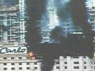 Almotamar Net - Jan. 25 (Bloomberg) -- A fire billowing black smoke broke out at the top of MGM Mirages 32-story Monte Carlo Resort & Casino on the Las Vegas Strip today, forcing the evacuation of its 3,002 rooms and gaming hall. No injuries were reported. 